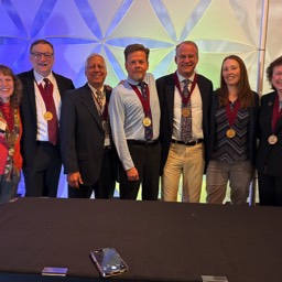 Photo of 2025 Induction: L-->R Karen Agee, Russ Hodges, Jack Truschel, Michael Frizell, Geoff Bailey, Jodi Lampi, Patricia Mulcahy-Ernt